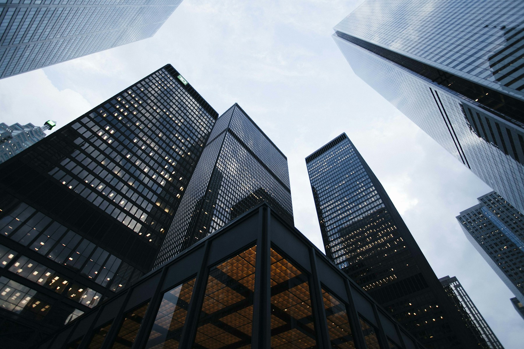 Modern glass commercial building viewed from below